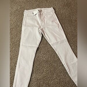 H&M white skinny jeans. Size 4. Never Worn.